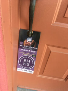 real_estate_door_hanger_on_the_front_door_of_home_in_antelope_ca